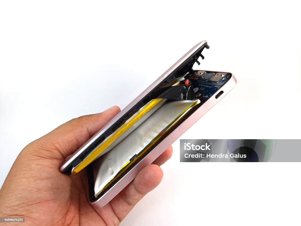 Swollen lithium polymer battery prying open a smartphone case